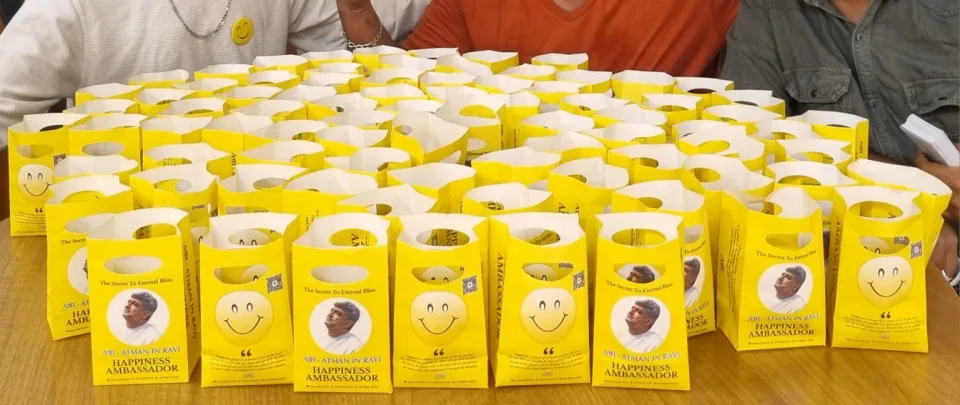 Bengaluru celebrates International Day of Happiness: Happiness Ambassador AiR-Atman in Ravi & Team spread cheer handing out over 10000 Happiness Goody Bags