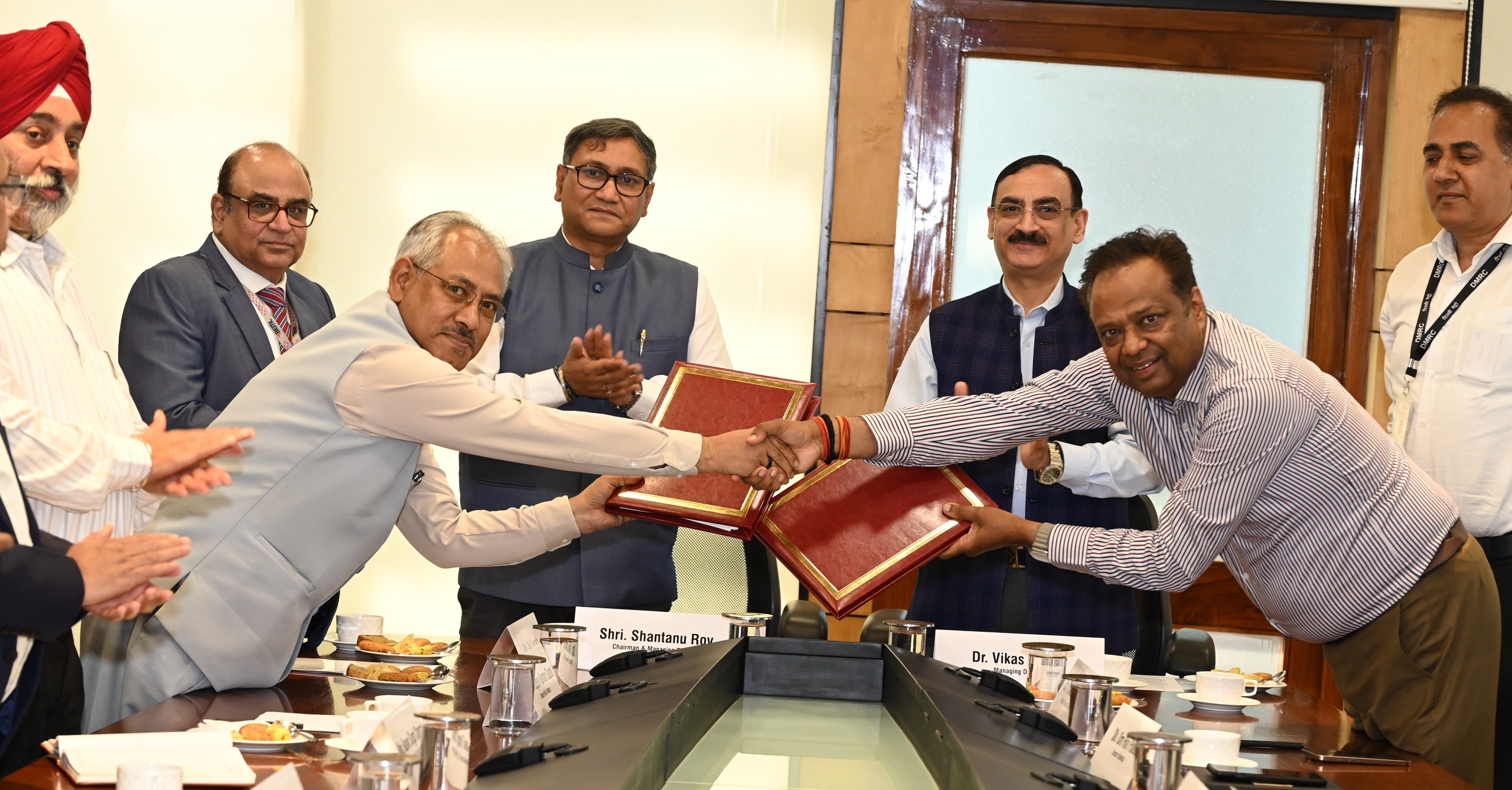 DMRC BEML MoU metro rail projects India overseas partnership